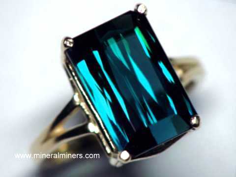 Handcrafted Natural Gemstone Cocktail Rings of <em>ALL</em> Minerals (image is a large natural blue tourmaline gemstone cocktail ring in 14k gold)