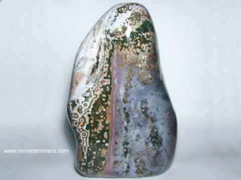 Mineral Carvings & Sculptures of <em>ALL</em> Minerals (image shown is a natural color ocean jasper sculpture carved by hand)