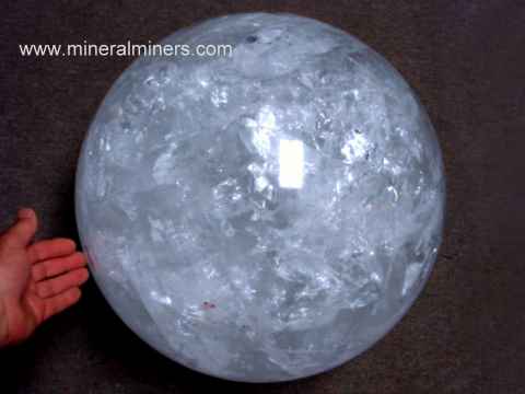Large Quartz Sphere: rare collector sphere of natural quartz crystal weighing 310 pounds!