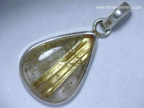 Gold Rutile in Quartz Pendant